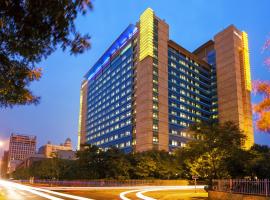 Marriott Executive Apartments Tianjin TEDA, hotel en Binhai