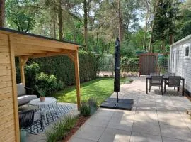 Boshuis met grote tuin I Vakantiepark met Zwembad