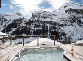 Powder Ridge - 6 bedroom chalet with hot tub, hotel Tignes-ben