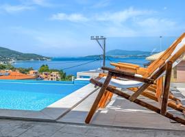 Oceanida sea view luxury suite, hotel u gradu Nikiana