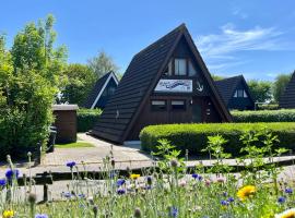 Nurdachhäuschen Blaue Nordseewelle, hotel di Carolinensiel