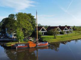 Vakantiehuis aan het water - vakantiepark de Schreiershoek, hótel í Dokkum