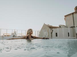 al 22 Suite & Spa Luxury Experience, hotell med jacuzzi i Polignano a Mare