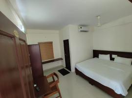 Masterkey Deluxe Rooms, hotell i Kakkanad