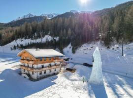 Nedererhof - Zimmer Alpenrose mit Gemeinschaftsküche, šeimos būstas mieste Schmirn