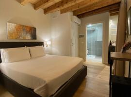 Malvezzi24 Boutique Rooms, hospedagem domiciliar em Desenzano del Garda