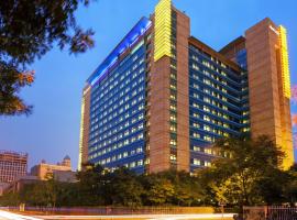 Marriott Executive Apartments Tianjin TEDA، فندق في Binhai