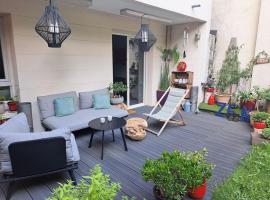 Viesnīca Appartement cosy avec jardin et parking pilsētā Ženeviljēra