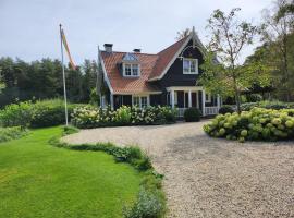 Huize Koempoelan, hotell med jacuzzi i Naarden