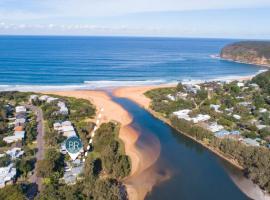 Wisteria Cottage on the Lagoon/Beach，Copacabana的飯店