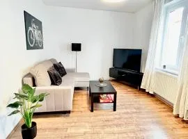 Zentrales City Apartment bis 4 Personen mit Küche und Wohnzimmer - 54m²