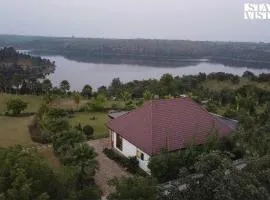 StayVista's Lakeside Whispers - Lake & Mountain-View Villa with Lawn & Indoor-Outdoor Games