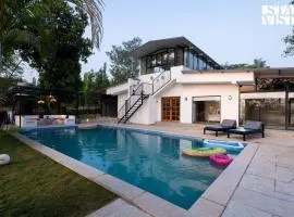 StayVista's The Oasis - Serene Retreat with Private Pool, Lawn & Gazebo