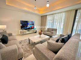 Calm Chaos 4 BR Villa with maid Room in Damac Hills 2, hotel din Dubai