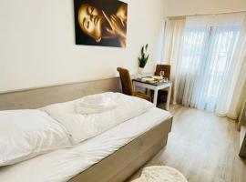 FeWo 20 - Appartement im Rottalblick - YoungModern wohnen mit Bademantelgang zur Therme, TV, Balkon und persönlichem Gästeempfang von Astarte Estate, ξενοδοχείο σε Bad Griesbach