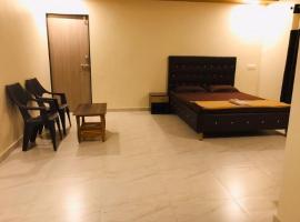 Vickys Guest House, hotel de playa en Malvan