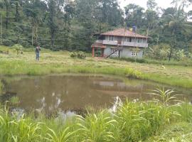 Samz estate stay 2BHK, hotell i Madikeri