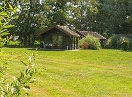 Trekkershut in de natuur, hotel din Putten