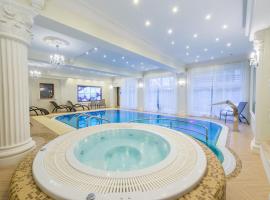 Hotel Solar Palace SPA & Wellness, hotel con piscina en Mrągowo