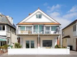 Absolute Beachfront with Decked Garden Oasis and Views