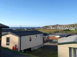 Experience Coastal Bliss in Our Modern 2019 Sea Viev 2 Bedroom static caravan at Clarach Bay Holiday Village!