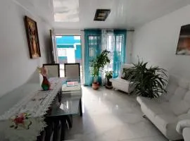 Habitacion privada en casa familiar con bano compartido