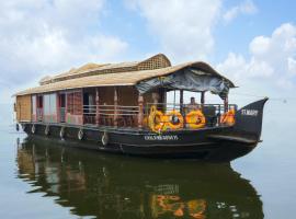 St. Mary Houseboat, alojamiento en un barco en Kumarakom