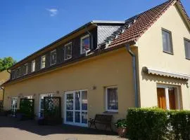 Maisonettenwohnung mit Wendeltreppe zu den Schlafzimmern mit Seeblick