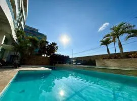 Confortável Flat, Edifício beira-mar com Piscina e hidro