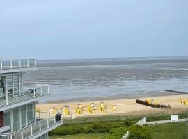 쿡스하펜에 위치한 호텔 Traumhafte Ferienwohnung - direkter Meerblick - 50m zum Strand in Cuxhaven Duhnen in 1A Lage im Haus Seehütte