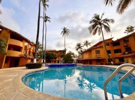 Un Oasis entre Olas y Palmeras con Playa Privada, hótel í Tucacas