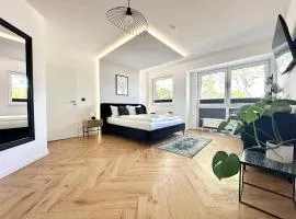 Modern Apartment - für Freunde & Familien, stadtnah, Parkplatz, E-Ladestation, Gitterbox für Fahrräder, Fitnessstudio, digitale Gästemappe mit Restaurant- und Unternehmenstipps