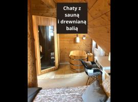 Chaty Świerkowe Wzgórze - drewniane domy z sauną i balią, шале у Карпачі