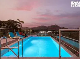 StayVista at Nova Nest with Rooftop Pool