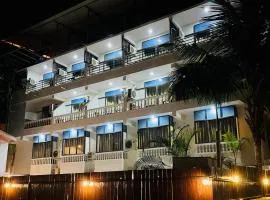 Hotel pleasure inn near turtle beach morjim Manage by ld group of hospitality