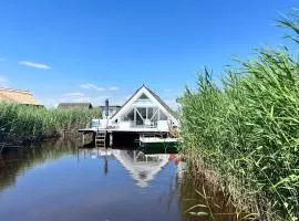 Seehütte Neusiedlersee - Strandhaus, Elektroboot inklusive