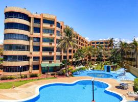 Apartamento en tucacas Cocotero mar 2 con la playa a tus pies, hótel í Tucacas