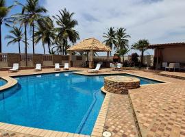 Apartamento con vista al Mar y salida a la playa, hótel í Tucacas