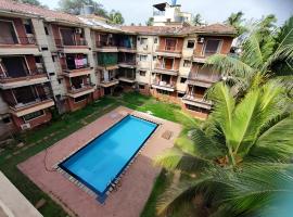 Ronne's 2BHK Lagoon Apartment -Calangute, aparthotel em Calangute