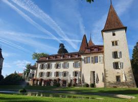 Schloss Münchenwiler, hotel i Murten