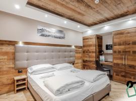 Hotiday Room Collection - Sauze Assietta, hotel u gradu Soz d'Ulks