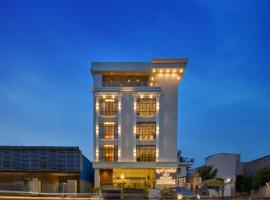 Grand Continent Mysore A Sarovar Portico Affiliate Hotel, hotel di Mysore