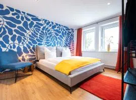 Bunter Hund Apartments - Zentrales Apartment, Parkplatz, Wintergarten, Kinderzimmer