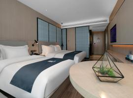 Eharm Hotel Jingzhou Olympic Sports Center, hotel i Jingzhou