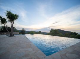 Can Pla Roig con vistas al Mar y la Puesta de Sol, villa i Sant Joan de Labritja