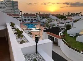 Apartamento Helena en Garden City con piscina climatizada