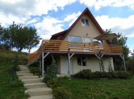 Căsuța din livadă, chalet i Secăria