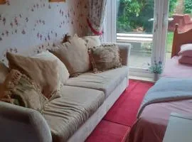 2 single beds for 2 guest, large room, Sofa, netflix, garden view, patio & seating