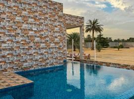 Luxury Farmhouse Near Yas Island With Swimming Pool, BBQ Area & Majlis, villa in Al Rahba