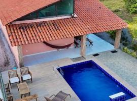 Casa com piscina no Condomínio Oásis do Mar - Lucena PB, hotel em Lucena